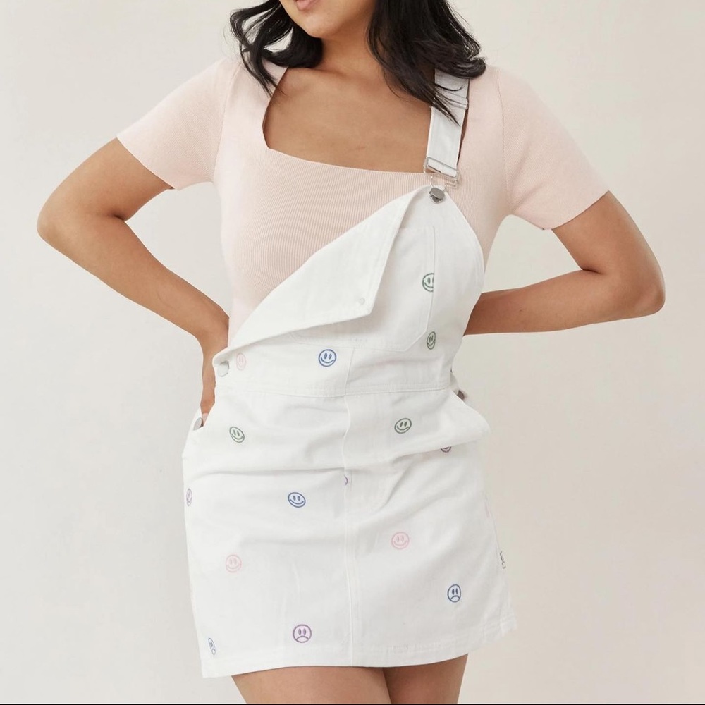 Dressed in LALA White Mini Skirt with Pastel Accents
